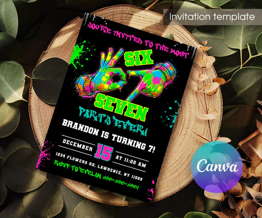 Six Seven Neon Hand Signs Birthday Invitation - Editable 5×7; invitation lying on a wooden tabletop.
